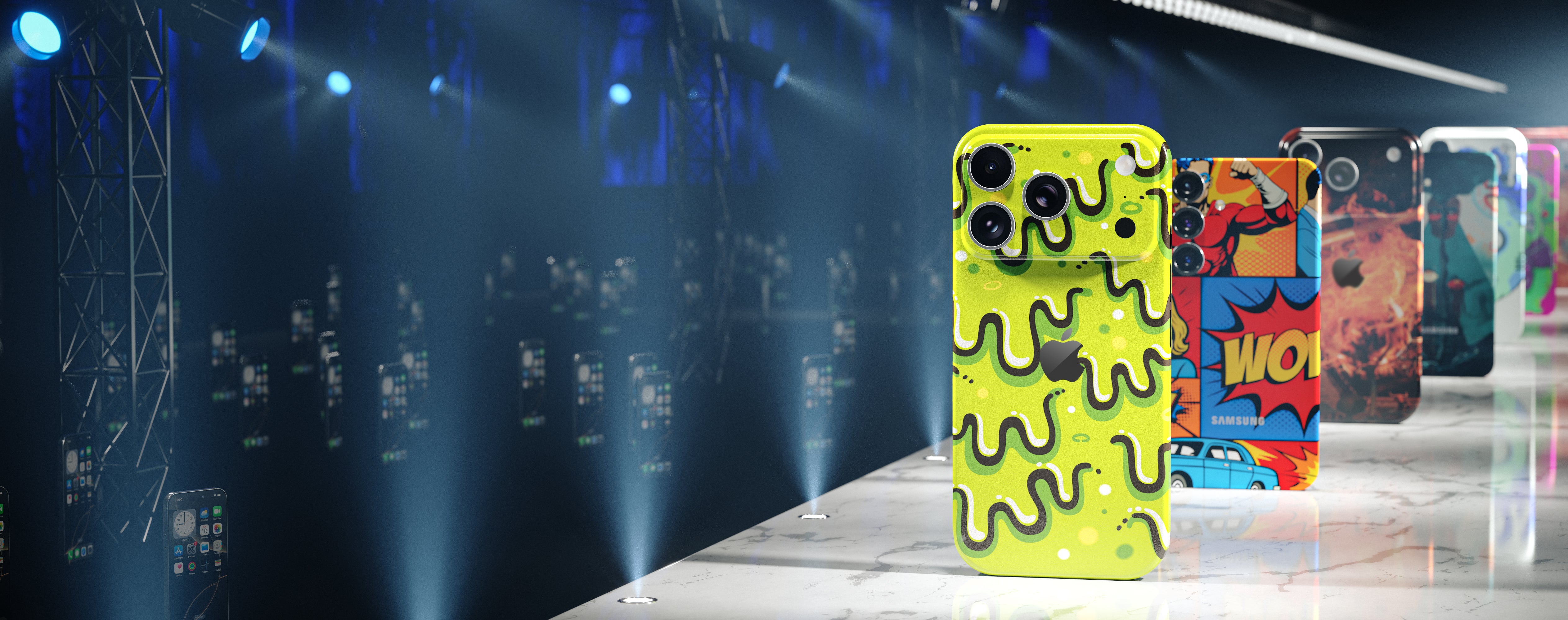 Colorful phone skins on a stage-like setting with spotlights